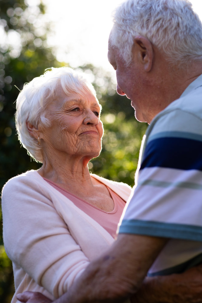 Happy caucasian senior couple embracing.